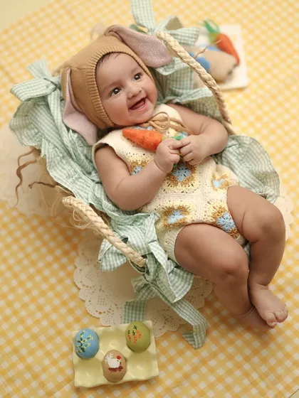 My precious baby Caden during his first Easter shoot. I put my heart into creating these detailed setups, painting eggs and gathering little props to make the moment magical.