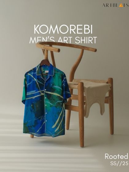 The Komorebi shirt styled on a chair, presented as art you can live in. It’s soft, soulful, and made for days that feel slow and warm.
