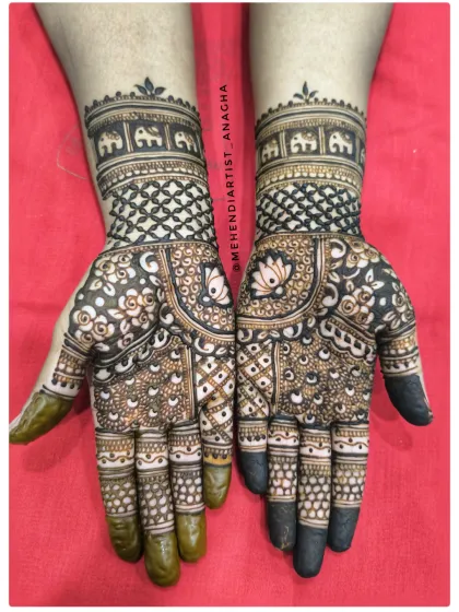 This Indian design features a band of elephants, a symbol of good luck. The mix of bold and fine lines gives it a unique texture.