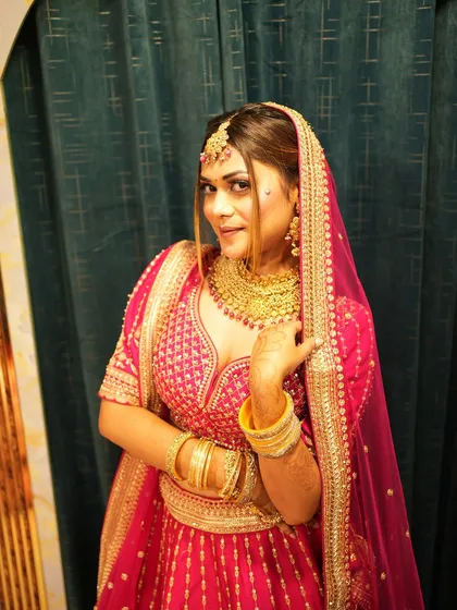 Explore our diverse collection of traditional red and pink bridal lehengas. Each piece, whether in rich velvet or silk, features unique embroidery and is designed to make your wedding day unforgettable.