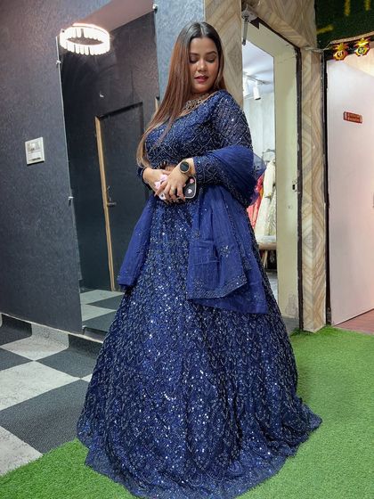 Another view of the navy blue sequin lehenga. The fit is perfect, and the client is ready to shine at her event.