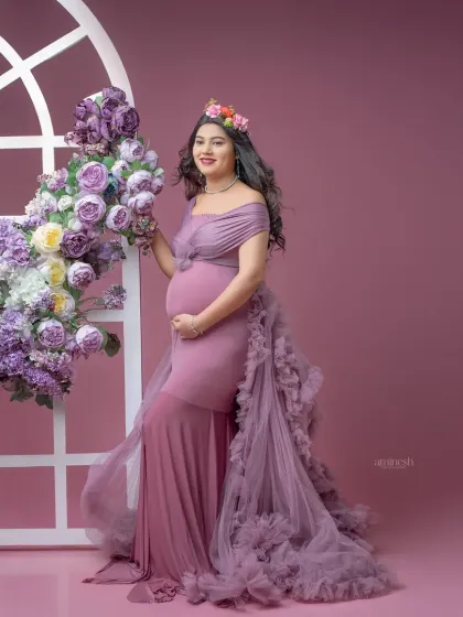 By adding props like this floral window frame, I can build a complete scene around you. This portrait combines the elegance of the gown with a touch of garden-inspired beauty.
