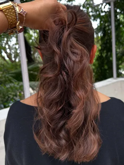 This 'Cinnamon Chocolate' color is perfect for adding warmth and spice to dark hair. The cinnamon tones really pop against the deep chocolate base, especially when styled with waves.