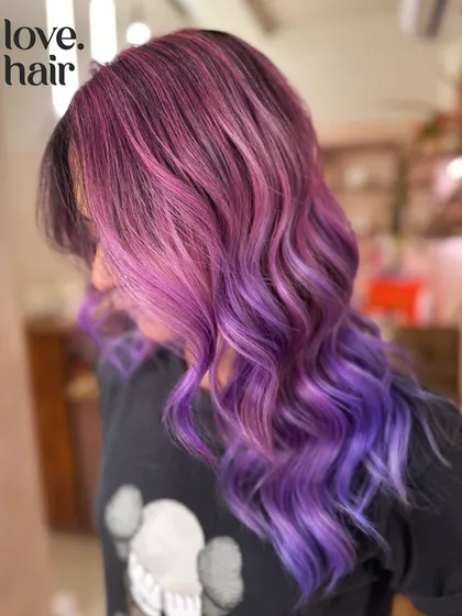 A side view of this vivid color creation, showing how the colors frame the face.