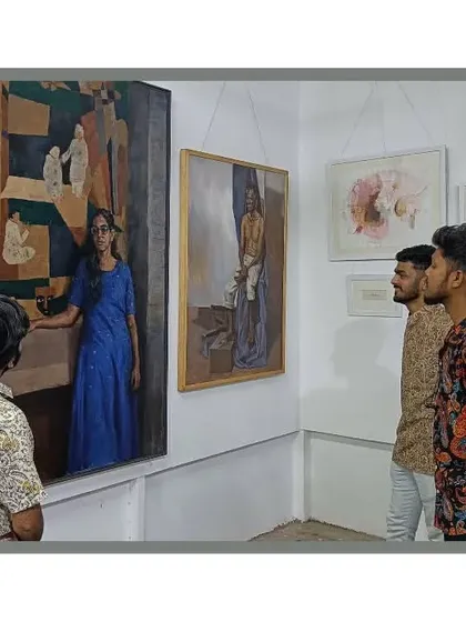 Visitors looking at my painting "Confused" during the annual exhibition.