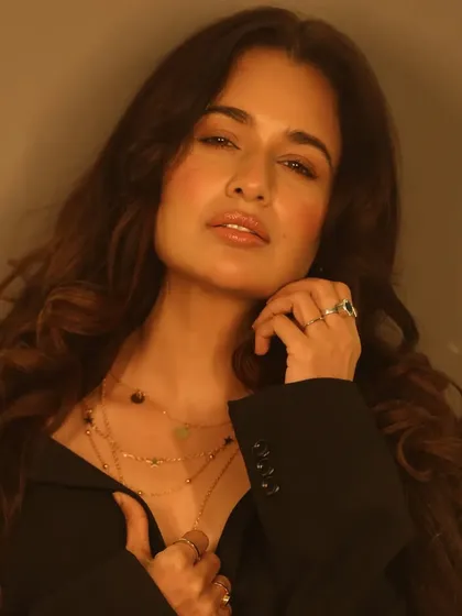 A duplicate of image 76, showing a close-up that feels intimate and real. The makeup looks like a second skin, enhancing her features without masking them.