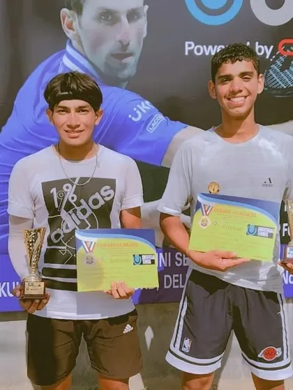 NTC's Manan Kumar celebrates his UTR under-18 championship win after a tough three-set final.
