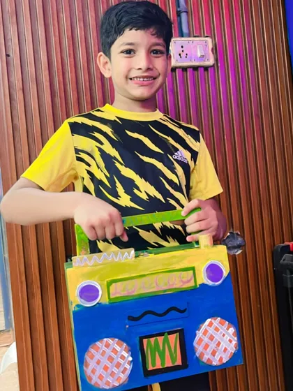 A very cool and colorful boombox, showing off this student's great eye for color combinations.