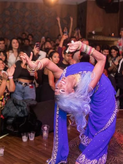 The incredible drag artist Lal Batti captivating the audience. My Bollywood Disco events often feature queer performers, blending drag artistry with filmi nostalgia.