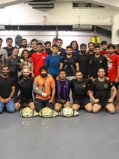 We are a team, a family, a wolfpack. This is our competition team, proudly displaying the championship belts earned through blood and sweat. When you train with us, you train alongside champions and are backed by a team that has your back, always.