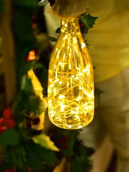 A detail shot of the fairy lights inside a bottle, one of the small lighting details that added a magical glow to the Cocomelon party.