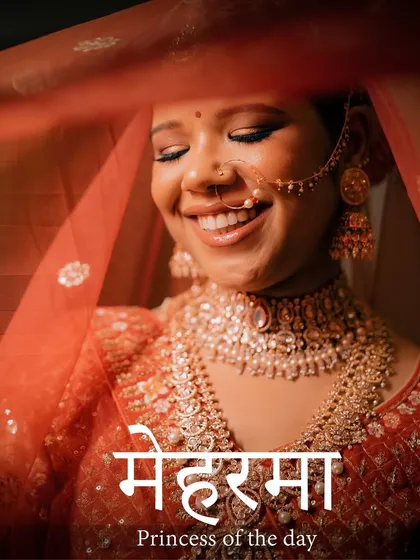 Capturing the soul of a bride on her wedding day is an art. This portrait focuses on her joyful expression and the intricate details of her bridal look, using a soft, warm light to create an image that is both beautiful and deeply emotional.