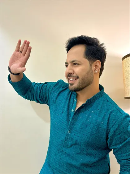 A candid wave in a teal kurta. This color is another one of my favorites for festive occasions.