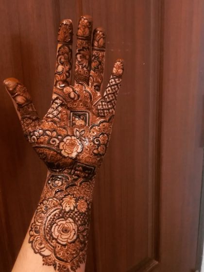 Mehendi Art by Nishat - Mehndi (Henna) Artistry Elegant Henna for Guests & Parties photo 47