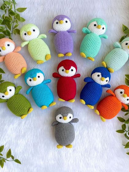 A rainbow of penguin babies! I made this colorful flock as return gifts for a birthday party. Each penguin is a different color, making them a unique and memorable party favor.