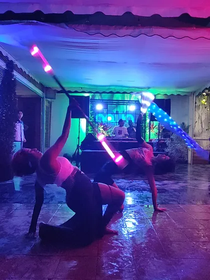 A synchronized LED staff duet with my crew. We can create bigger, more complex light shows for larger stages, combining our skills for a truly mesmerizing group performance.