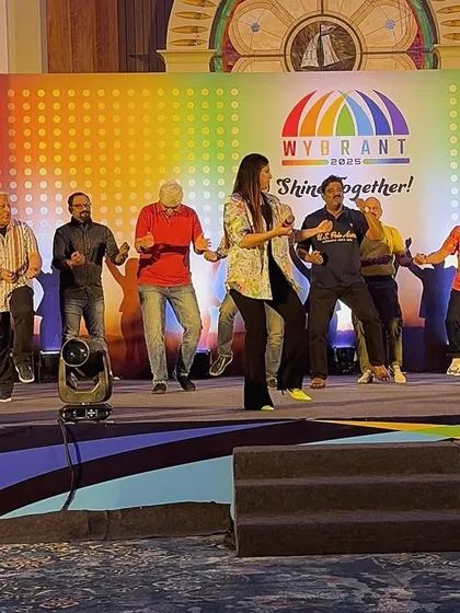 It's not just about speaking; it's about creating an experience. I love getting everyone involved, even the senior leadership, as seen here during a fun dance segment at the Wysetek team event.