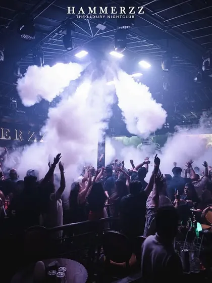 A blast from the smoke cannons at Hammerzz, creating a flower of smoke over the crowd.