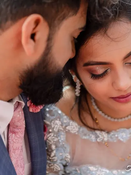An intimate close-up capturing the quiet connection between the couple. This shot focuses on their gentle expressions and the feeling of peace they share.