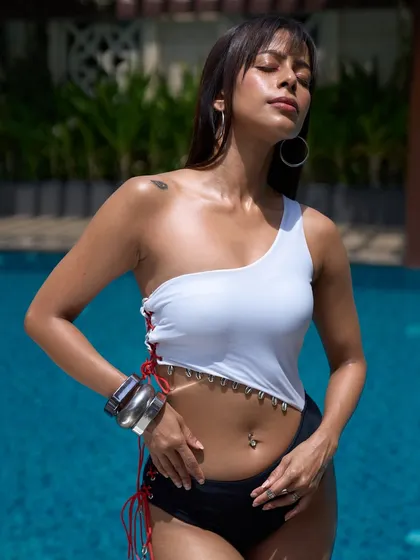 Summer on my mind. This is an unedited, no-filter photo from a swimsuit shoot, showcasing a dewy, sun-kissed glow that looks completely real and effortless.
