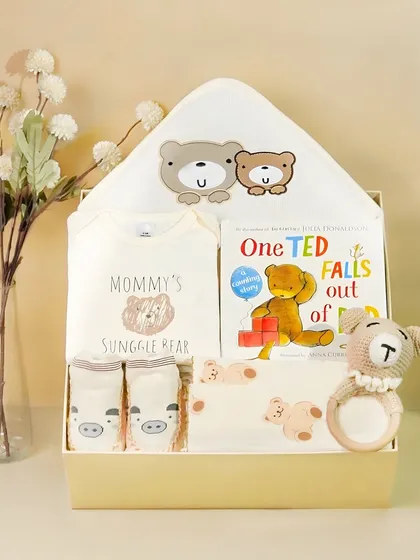 A 'Mommy's Snuggle Bear' gift box. The items are beautifully arranged within the box, giving customers a clear view of what they will receive.