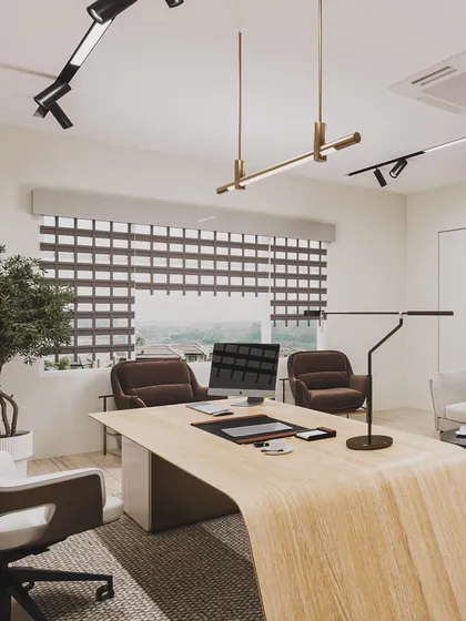 A wider view of the MD cabin, showing the seating area for guests and the modern lighting design.