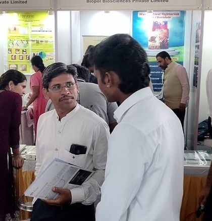 Our team engaging with attendees at the Global Bio India 2024 roadshow, discussing how our consulting services can help scale biotech and manufacturing ventures.