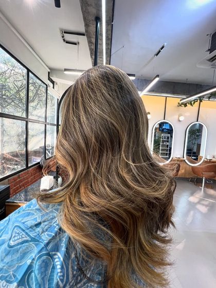 A closer look at the layered cut and color, showing how the style has both movement and dimension.