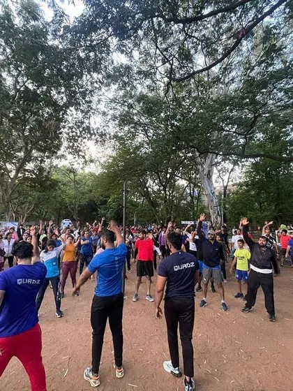 The Quadzfam warming up together before the 2023 Marathon. The energy and support from the group before the run was incredible.