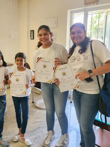Our youngest band members proudly display their certificates after performing ABBA's "I Have a Dream". It's never too early to start performing and giving back to the community.