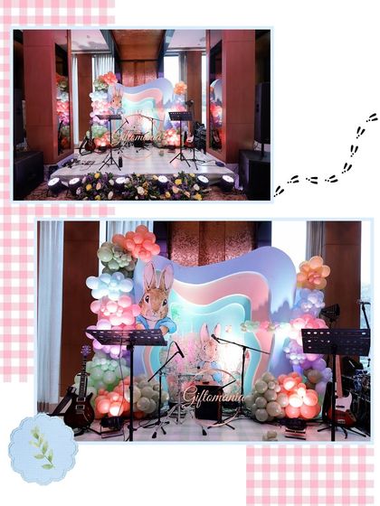 Even the stage for a live band performance is incorporated into the Peter Rabbit theme, with a pastel-colored backdrop and character cutouts.