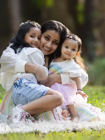 A beautiful hug between a mother and her two daughters. Sibling and parent shots are an essential part of every family session.