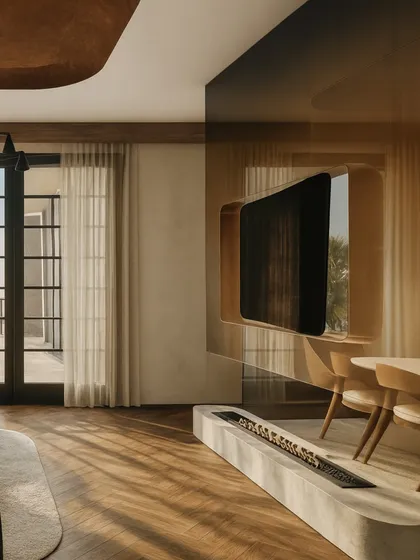 To connect the lounge and dining areas, we designed a custom tinted acrylic partition with a swivel TV. This innovative solution allows for an open layout while providing media access from both sides.