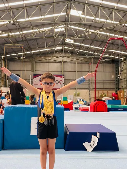 Another shot of our young champion in the arena, surrounded by his well-earned medals. Way to go, Saurvik.
