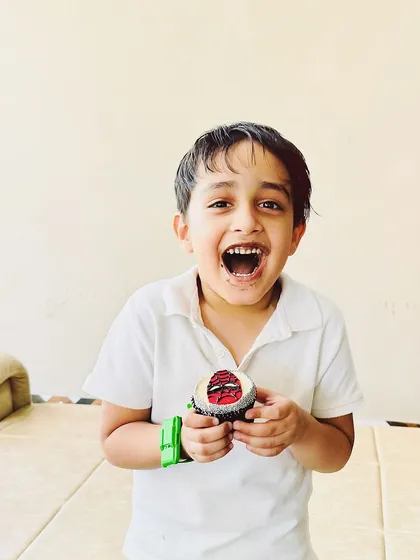 This is why we do what we do. Seeing the pure joy on a child's face when they see their birthday cupcakes is the sweetest reward. Moments like these make every celebration extra special.