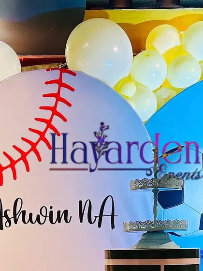 A custom baseball-themed backdrop, part of a multi-sport party decoration.