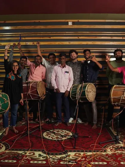 The 'jaathre' or festival vibe is real! This is our amazing team of Dollu players from Sagara, bringing their incredible energy to the studio. My sessions are about this kind of joy and community, celebrating the rich folk rhythms of my homeland.