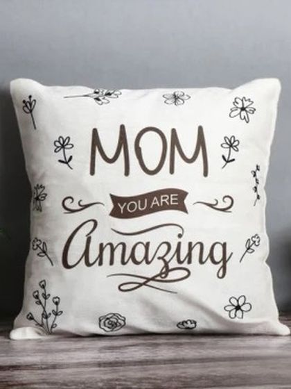 Let your mom know she's amazing with this beautifully designed cushion. It features lovely typography and floral doodles, making it a stylish and comfortable gift for Mother's Day.