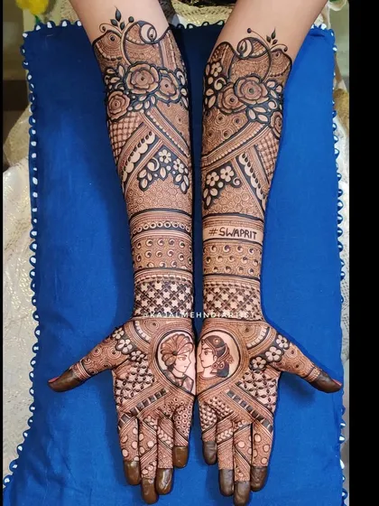 A perfect blend of portraiture and pattern work. This bridal design features the couple's portrait in a heart, surrounded by beautiful floral bands and geometric grids.