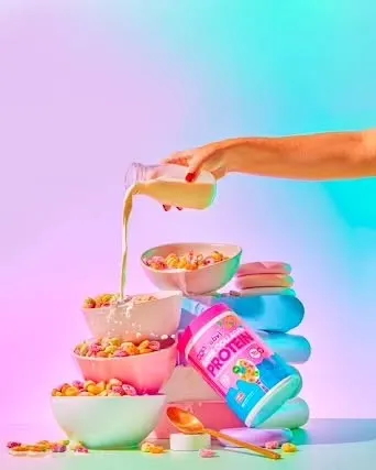 Color and action are a powerful combination. I created this playful, gravity-defying stack of bowls for a protein cereal brand, using a dreamy pastel gradient background. The pouring milk adds a dynamic element that makes the whole scene feel energetic and fun.