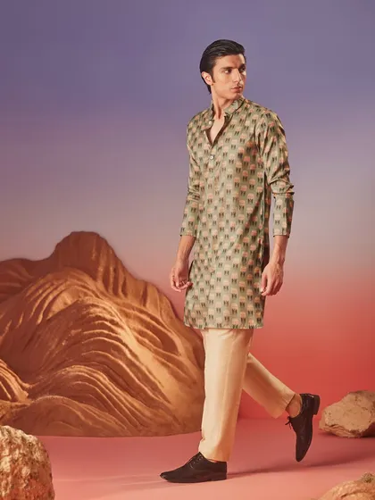 From the Wadi Collection, this printed kurta features a unique geometric pattern in earthy tones, offering an artistic and contemporary option for festive dressing.