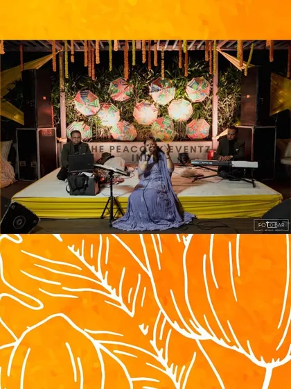 A talented female singer performing at the Taj Gurgaon. The stage is set with classic, elegant decor, showing how I integrate the performance area with the event's overall theme.