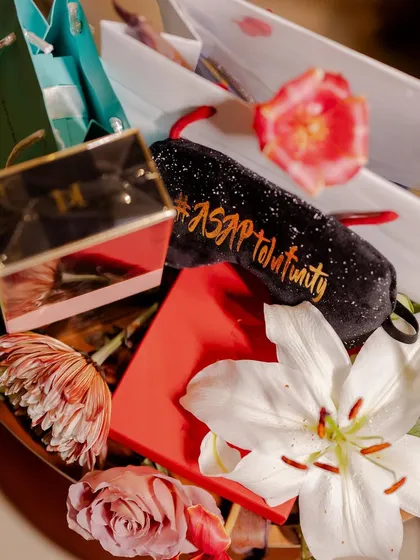 A curated welcome bag for guests, including personalized items like an eye mask with the wedding hashtag. We ensure guests feel welcomed and pampered from the moment they arrive.