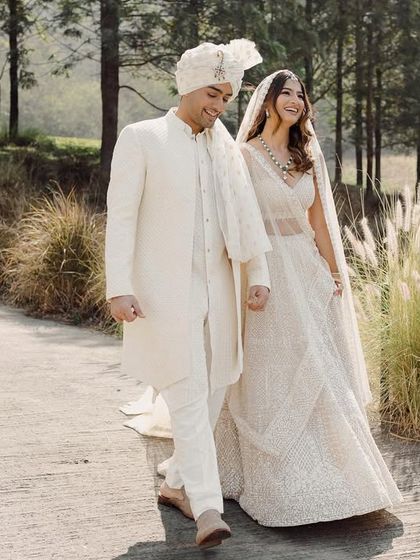 A candid moment during their walk through the woods. The couple is relaxed and happy, their connection feeling natural and unposed. This is the essence of my documentary approach to portraits.
