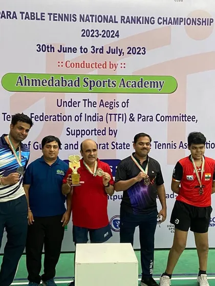 The winners of the Para Table Tennis National Ranking Championship on the podium. Our player Gajanan Parmar is centered, holding his gold medal and trophy.