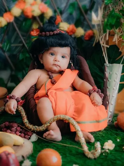 The full setup for our Ram Navami shoot, complete with a forest backdrop, fruits, and a tiny bow.