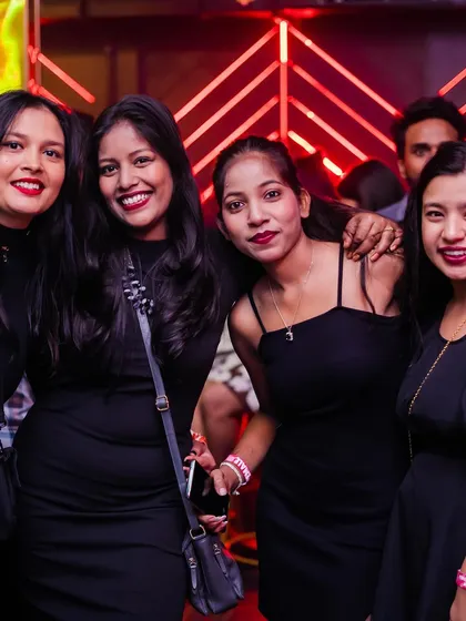 A group of friends posing for a photo.