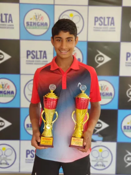 Tavish with his trophies after winning both the Singles and Doubles titles at the U14 National Series in Jalandhar. Dominating a national series event like this is a huge accomplishment.