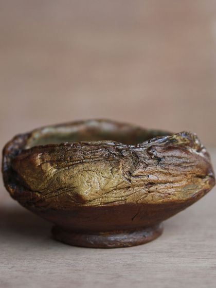 A double walled bowl with a heavily textured exterior, showcasing the results of a workshop where I embraced experimentation and let go of the fear of failure.