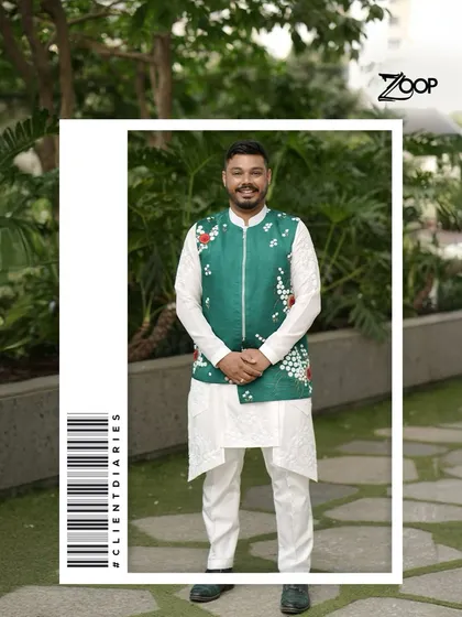 A proud dad-to-be. He is stepping into this new journey in style with a custom green floral jacket, because big moments deserve the best look.